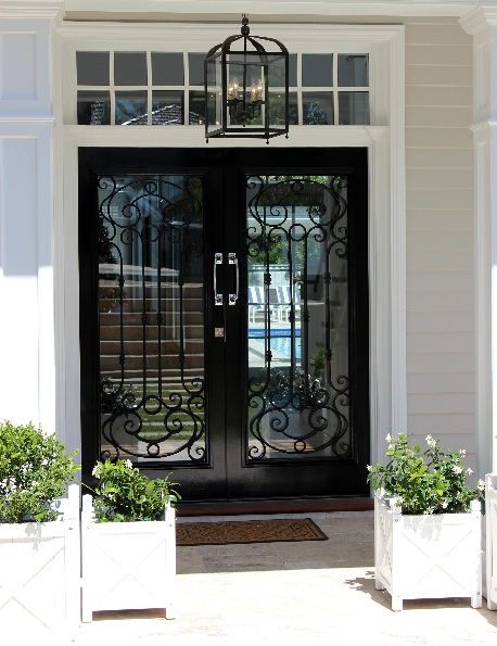 Belfast door with ornate transom window 