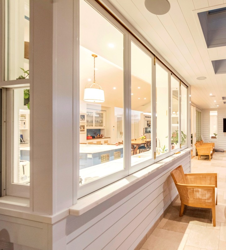 Bifold window external view timber Cedar West