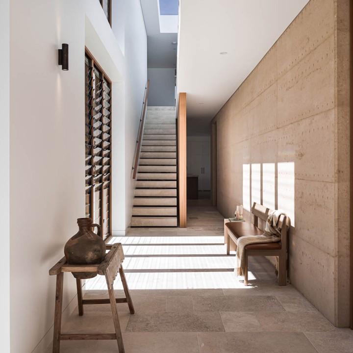 Louvre window rammed earth home Cedar West