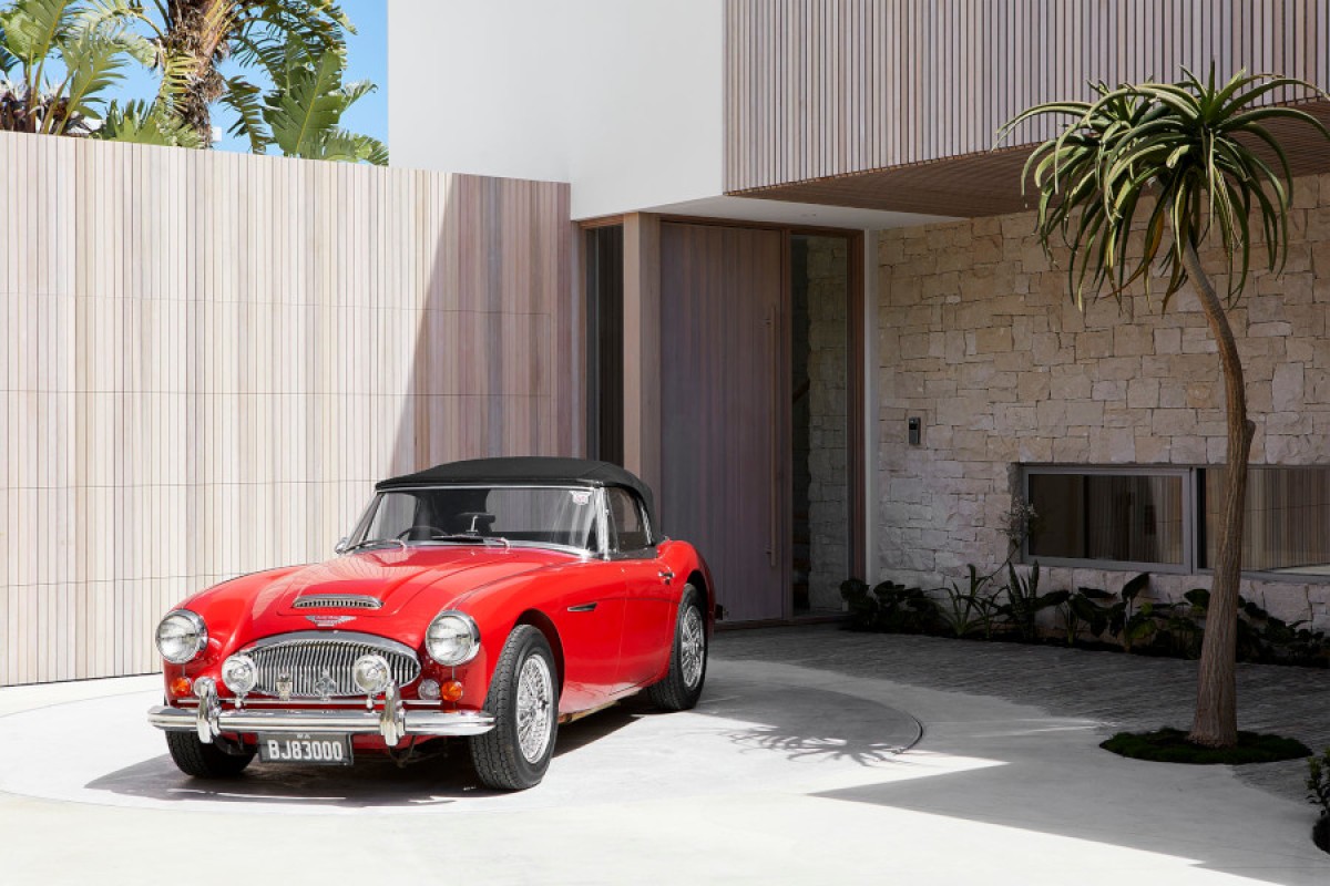 Aston door red car Cedar West