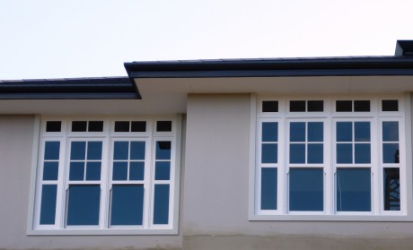 Double hung windows with bars timber painted white