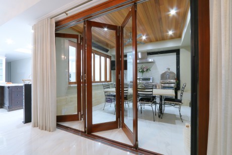 Bifold doors lounge area timber glass Cedar West