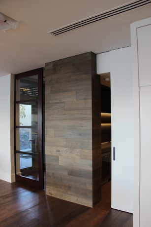 Cavity sliding door two dark timber and white painted timber Cedar West
