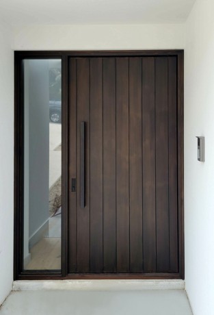 Mighton timber door with black handle