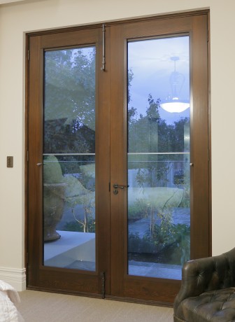 Sapphire door close up frameless sashless window insert Cedar West