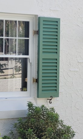 External timber green shutter by Cedar West