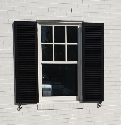 Double-hung window shutters Cedar West