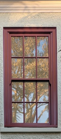 Double hung sash window painted red custom Cedar West