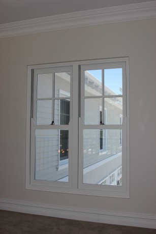 Double hung window painted white Hamptons Cedar West