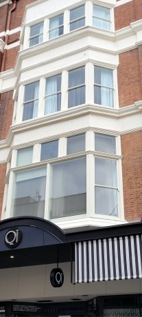 Newcastle East heritage project hotel fixed windows double hung pilasters dentil cornices Cedar West